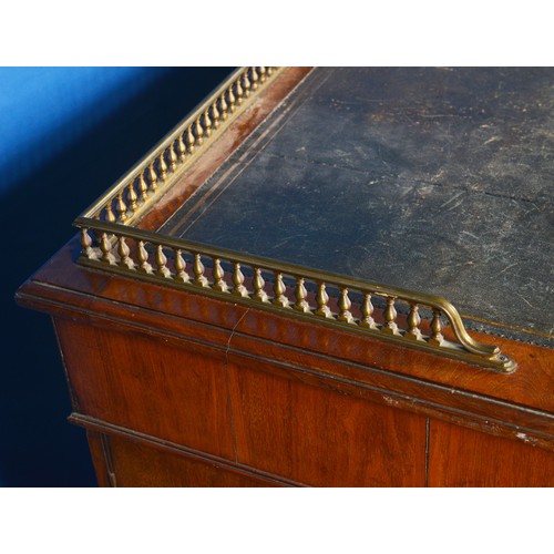 524 - A Victorian Mahogany Pedestal Desk fitted with three graduated Drawers over a bank of three drawers,... 