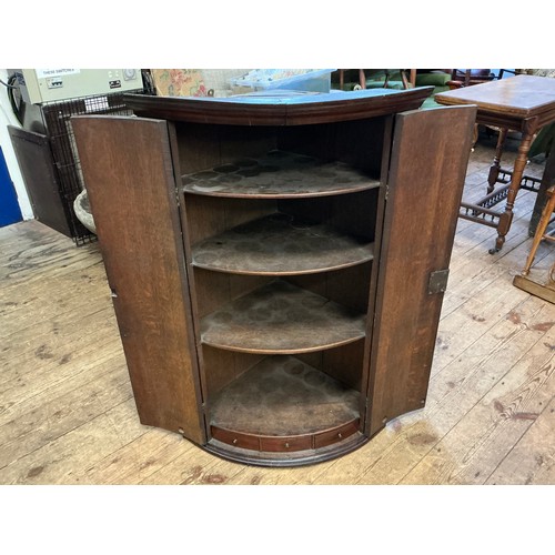 538 - A Georgian Mahogany Veneered Corner Cupboard with Line inlay & 'H' hinges. Measuring: 46cms deep x 6... 