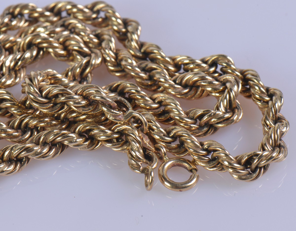 A heavy 9ct gold rope chain, stamped 9k and 375 on the clasp, the chain ...