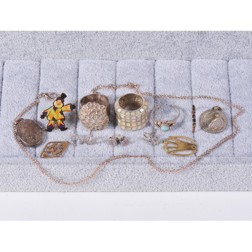 173 - A collection of costume jewellery, to include silver rings, earrings, Silver locket, 925 horseshoe e... 