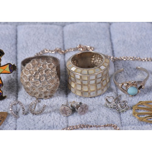 173 - A collection of costume jewellery, to include silver rings, earrings, Silver locket, 925 horseshoe e... 