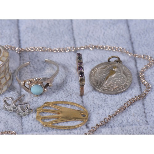 173 - A collection of costume jewellery, to include silver rings, earrings, Silver locket, 925 horseshoe e... 
