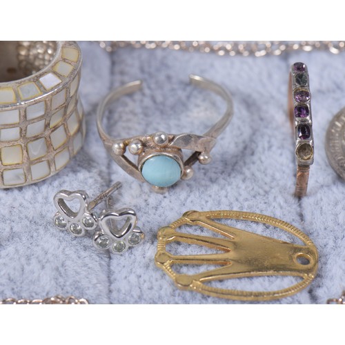 173 - A collection of costume jewellery, to include silver rings, earrings, Silver locket, 925 horseshoe e... 
