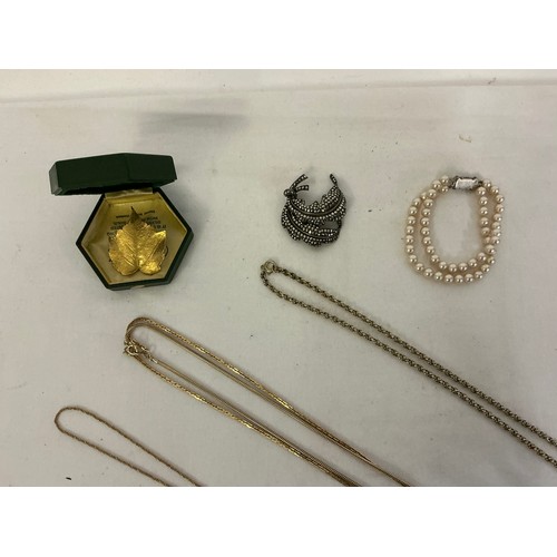 175 - A varied collection of costume jewellery, comprising a costume pearl necklace and matching bracelet,... 