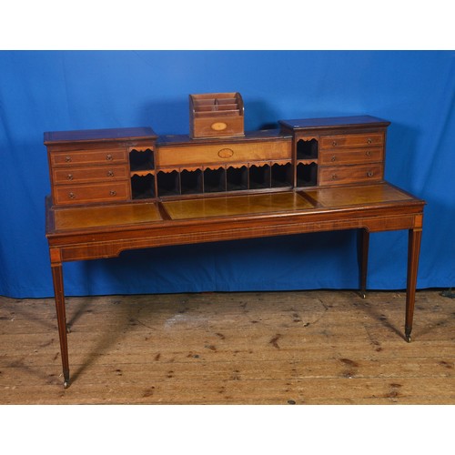 644 - An Edwardian designed Sheraton Writing Desk fitted with banks of Drawers, Lift Top Centre Section, P... 
