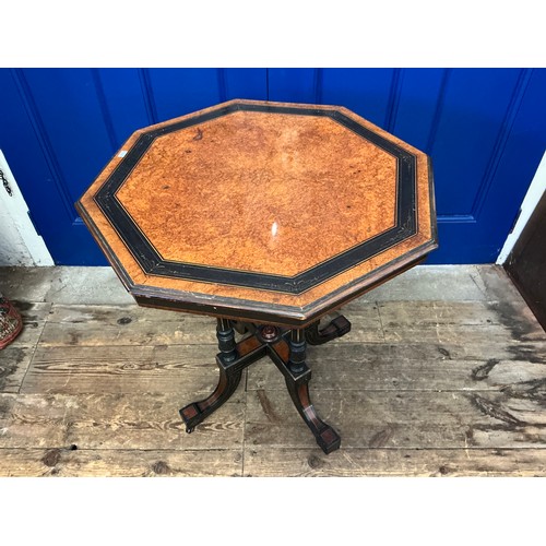 650 - A Victorian Amboyna Wood Inlaid & Ebonised Octangle Top Drawing Room Table resting on Swept out quad... 