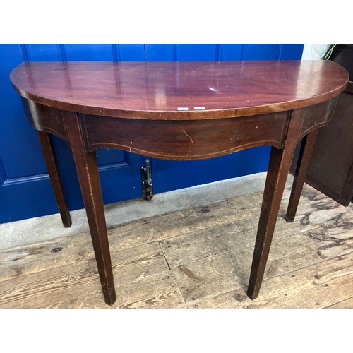 655 - A Georgian Demi-Lume Table Section resting on Square Legs. Measuring: 111.5cms across x 55cms deep x... 