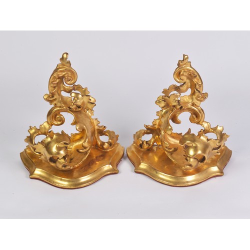 660 - A Pair of Carved Gilt Wood Wall Appliques of Floral Form with red velvet mounts after a design too C... 