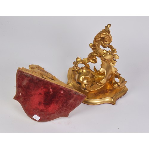 660 - A Pair of Carved Gilt Wood Wall Appliques of Floral Form with red velvet mounts after a design too C... 