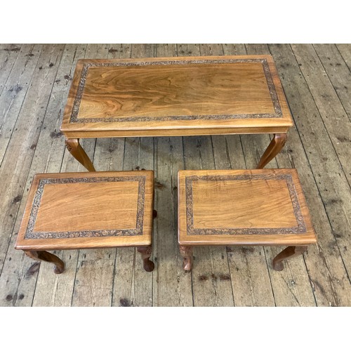 666 - A Graduated Set of Indian Carved Top Coffee Tables. Largest Measuring: 90cms x 45cms x 44cms high.