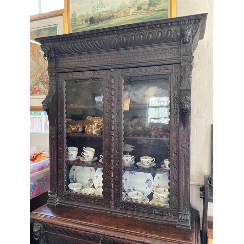 670 - A Victorian Pussycat Oak Bookcase with Fret Carved Door, Column Sides, Gadrooned Scroll over Top, Si... 