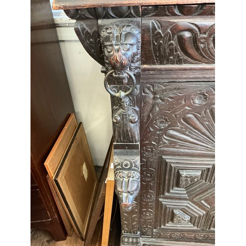 670 - A Victorian Pussycat Oak Bookcase with Fret Carved Door, Column Sides, Gadrooned Scroll over Top, Si... 