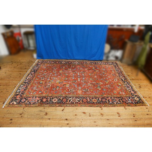 675 - An Antique Persian HERIZ Carpet Circa 1900. Measuring: 10 Feet x 8 Feet.