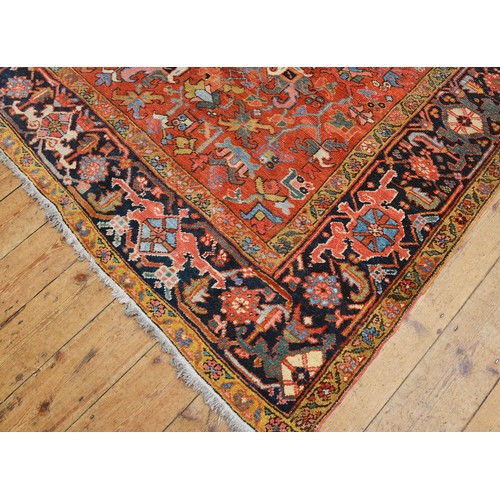 675 - An Antique Persian HERIZ Carpet Circa 1900. Measuring: 10 Feet x 8 Feet.