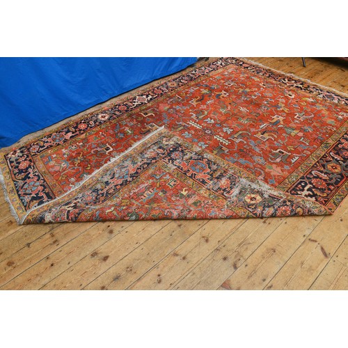 675 - An Antique Persian HERIZ Carpet Circa 1900. Measuring: 10 Feet x 8 Feet.