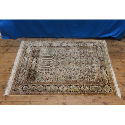 676 - A Superb Qum Silk Rug in a pale Cream with a Central Medallion Panel of a Temple with hanging Flower... 
