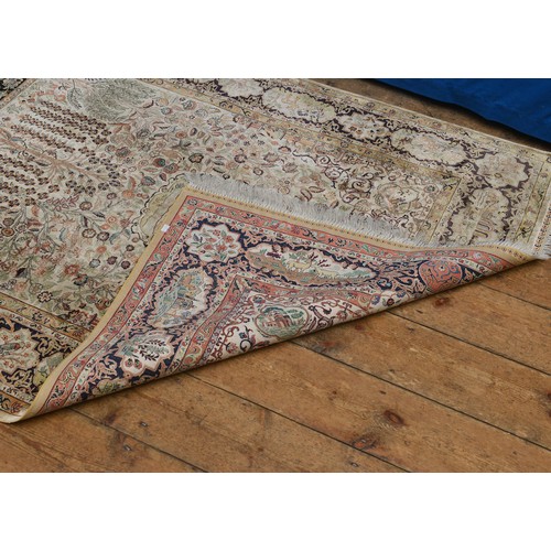 676 - A Superb Qum Silk Rug in a pale Cream with a Central Medallion Panel of a Temple with hanging Flower... 
