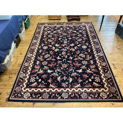 678 - A Louis de Poortere/Mossoul Blue & Beige Rug. Measuring: 350cms x 200cms.