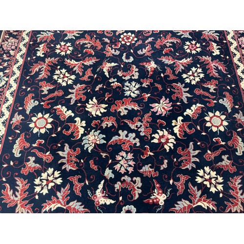 678 - A Louis de Poortere/Mossoul Blue & Beige Rug. Measuring: 350cms x 200cms.