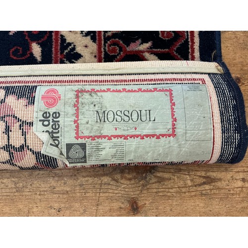 678 - A Louis de Poortere/Mossoul Blue & Beige Rug. Measuring: 350cms x 200cms.