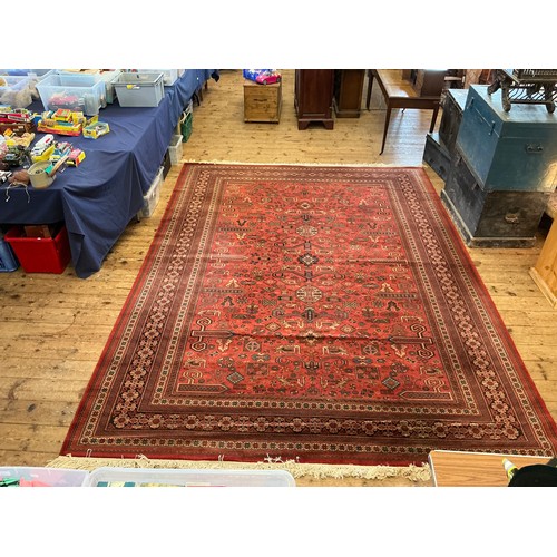 679 - A Large Louis de Poortere/Mossoul Red & Beige Ground Rug. Measuring: 373cms x 275cms. XXX