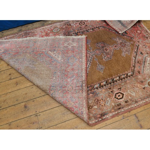 681 - A Red Ground Blue & Cream decorated Carpet/Rug with Gulls & Stylised Border. Measuring: 245cms x 160... 