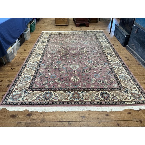 682 - A Light Burgundy Ground All Over Floral patterned Beige Bordered & Deep Blue Sided Persian Rug, Sign... 