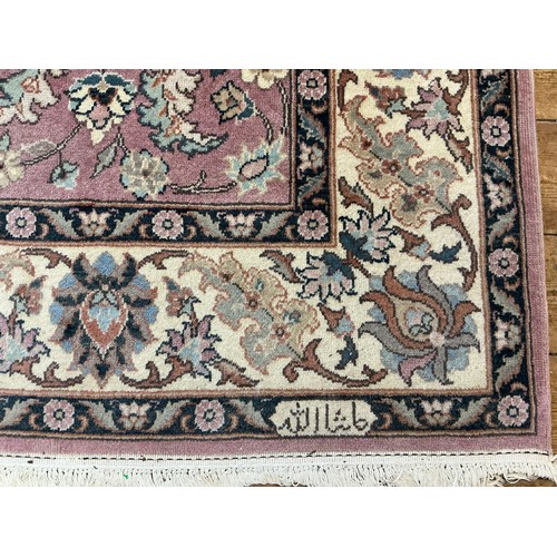 682 - A Light Burgundy Ground All Over Floral patterned Beige Bordered & Deep Blue Sided Persian Rug, Sign... 