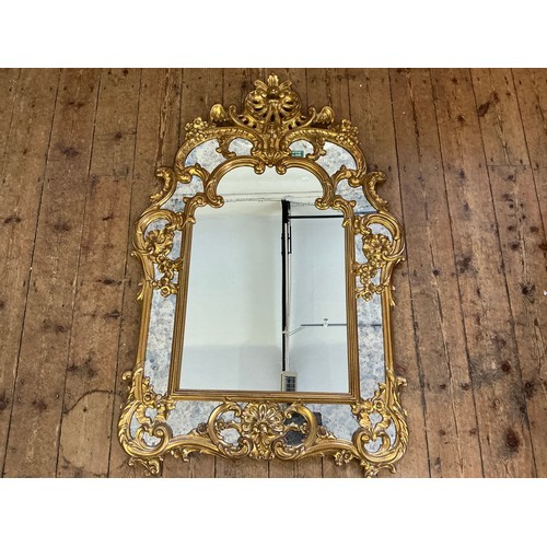 689 - A Large Rococo design Scroll & Shell Entrance Hall Mirror with panelled sides. Measuring: 90cms x 13... 