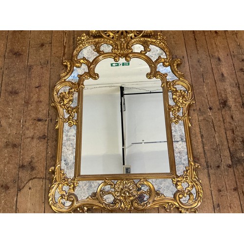 689 - A Large Rococo design Scroll & Shell Entrance Hall Mirror with panelled sides. Measuring: 90cms x 13... 