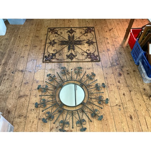 690 - A Metal Circular & Radiating Wall Mirror & a Decorative Floral Applique. Measuring: 103cms x 103cms.