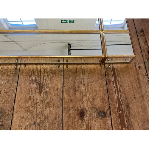 693 - A Modern Contemporary Over Mantle Mirror. Measuring: 77cms x 101cms.