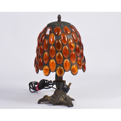 696 - An Indian made Table Lamp decorated with 'Amber' beads. Measuring: 35cms high.