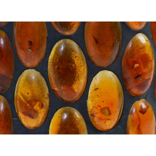 696 - An Indian made Table Lamp decorated with 'Amber' beads. Measuring: 35cms high.