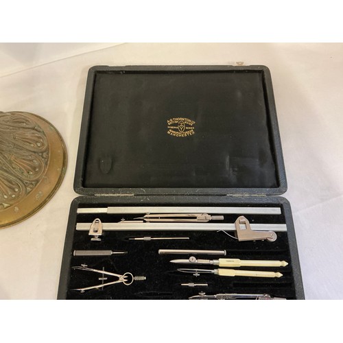 705 - A Victorian Oil Lamp with Glass Reservoir along with Two Cased Sets of Drawing Instruments.