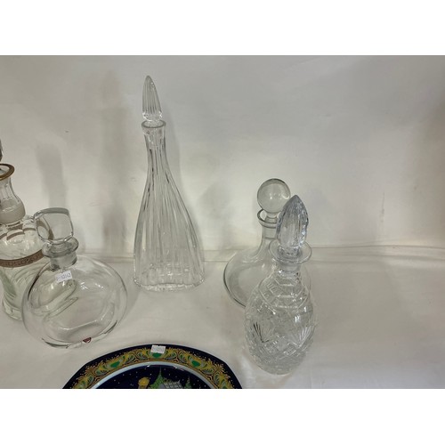 707 - An Orrefors Glass Decanter & Stopper along with Four other Decanters & a Rosenthal Christmas Carol 1... 