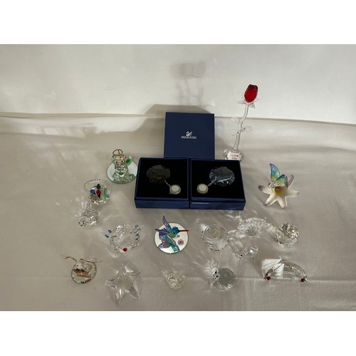 713 - A Collection of 16 Swarovski Glass figurines, two with Original Boxes.