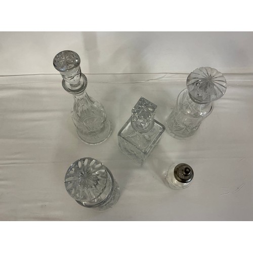 718 - A Collection of Four Decanters.