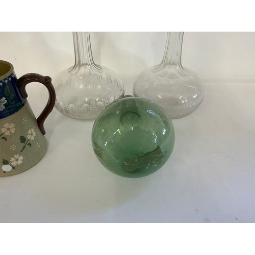 725 - A Green Bottle Shaped Vase taken from Dunkirk, two decanters & a Lovett Jug.