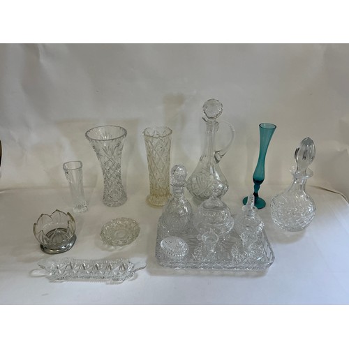 727 - A Collection of Glass to include a Cutglass Claret Jug, Dressing Table Set, Vases, Trumpet Vases, et... 