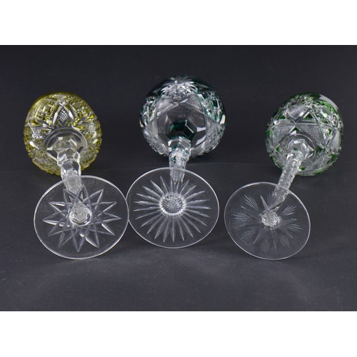 730 - Two Green Cut & Faceted Hock Glasses on faceted stems & Star Cut Bases one other in Olive Green. (AF... 