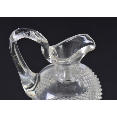 731 - A Cut Glass Whiskey Thistle Shaped Decanter with Handle & Hobnail cut & Stopper. Measuring: 30cms Hi... 