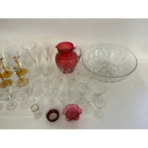 735 - A Cranberry Glass Bubble Jug, a Cutglass Bowl, Amber stemmed Glasses, Woolworths Cut Glass, etc.