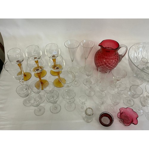 735 - A Cranberry Glass Bubble Jug, a Cutglass Bowl, Amber stemmed Glasses, Woolworths Cut Glass, etc.