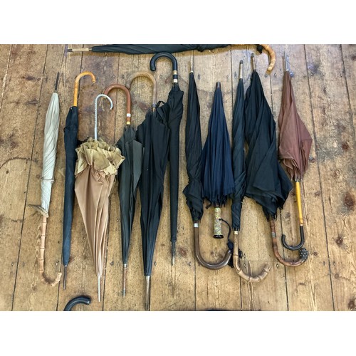 745 - A Collection of 14 various Vintage Umbrellas.