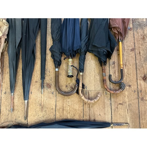 745 - A Collection of 14 various Vintage Umbrellas.