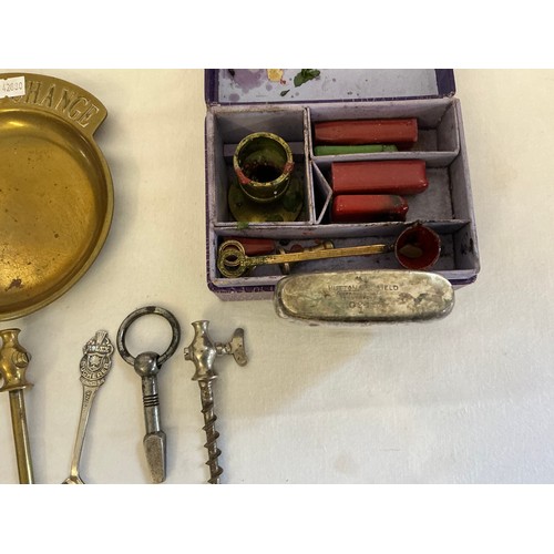 811 - A Coppard Excelsior Champagne Tap, one other, Haig Whiskey Pourer, Two Rolex Tea Spoons, etc.