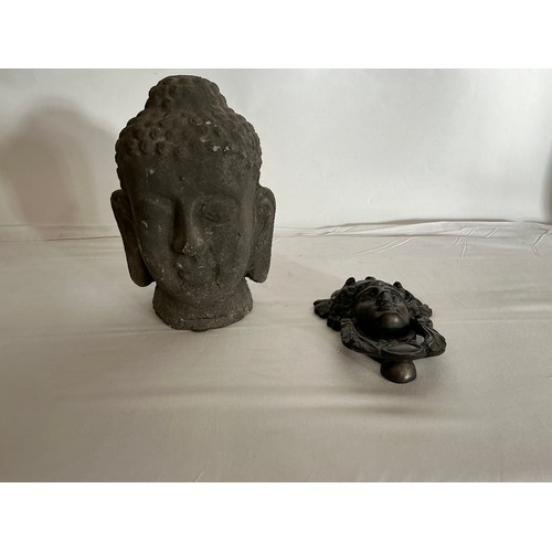 881 - A Bronze Door Knocker of a Young Ladies Head & a Pottery Temple God Head.