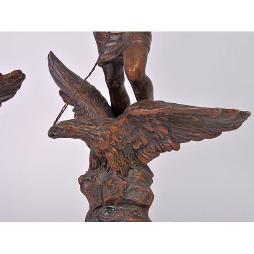 882 - A Pair of French Spelter Victoire on Eagle Statuettes on Limestone Bases. Measuring: 51cms High.