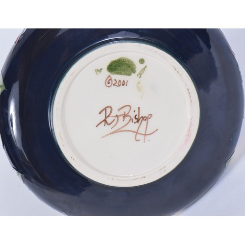 893 - A Moorcroft Vase decorated with Prairie Summer pattern after Rachel Bishop. Standing: 22cms high. Da... 